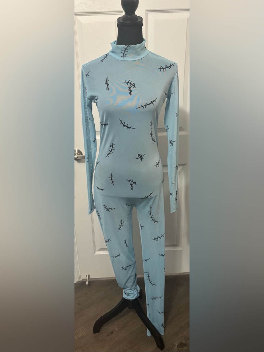 Dolls Kill / Trickz N’ Treatz Nightmare Before Christmas Sally Jumpsuit
